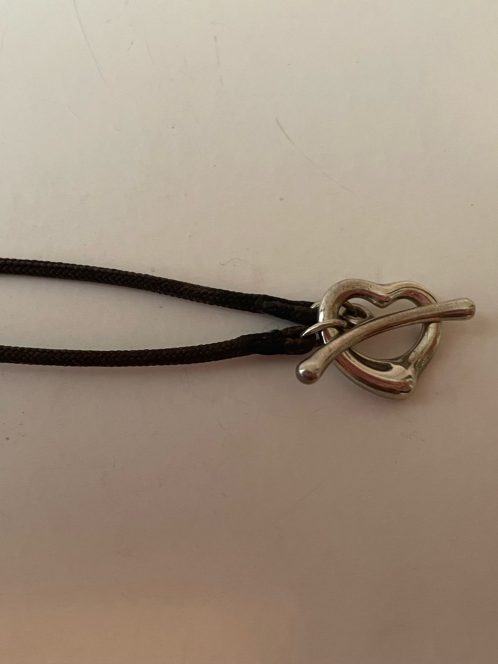 Tiffany & Co. Black Cord Bracelet with Silver Heart Toggle